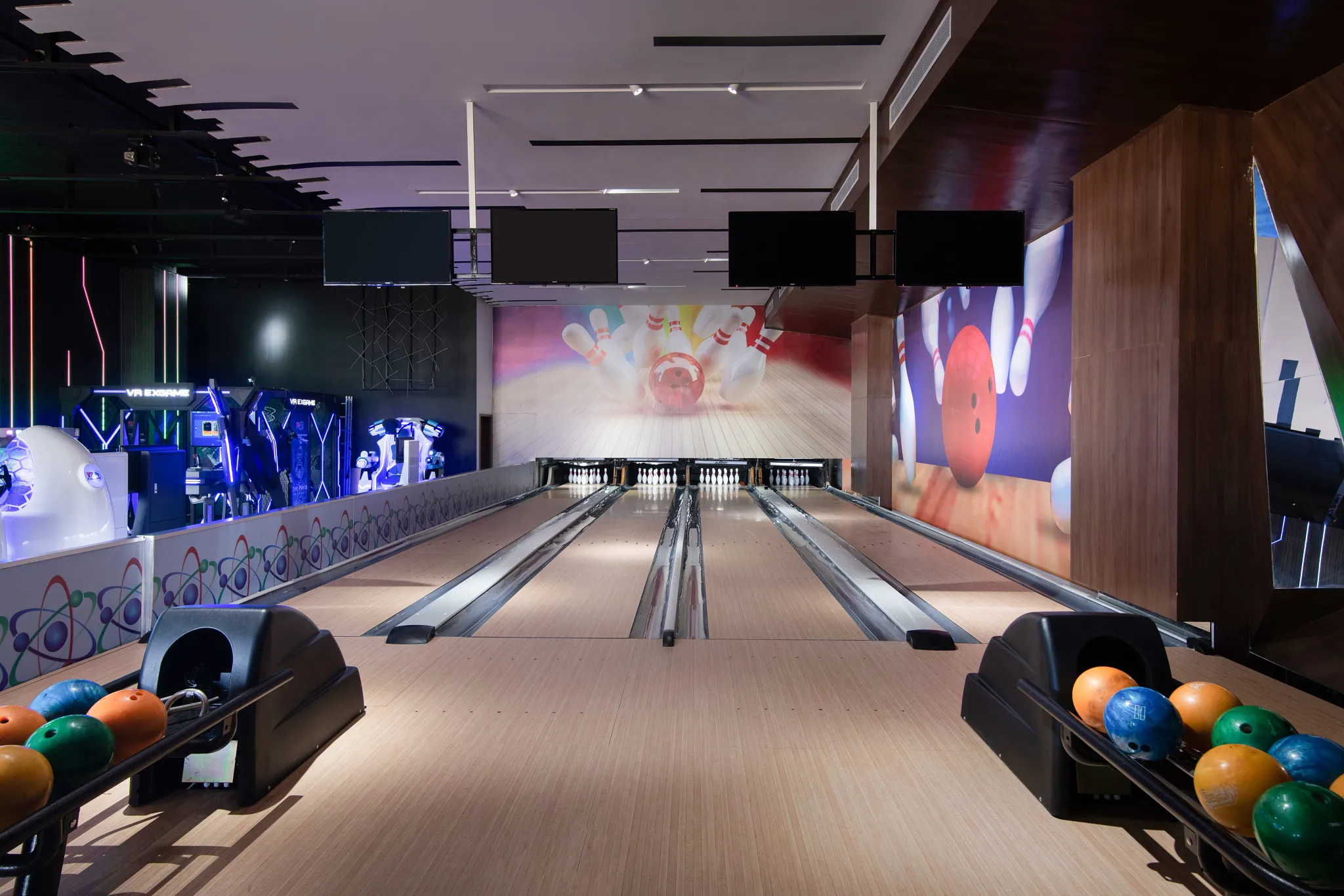 Modern bowling alley and entertainment arcade at Dreams Macao Beach Punta Cana Resort.