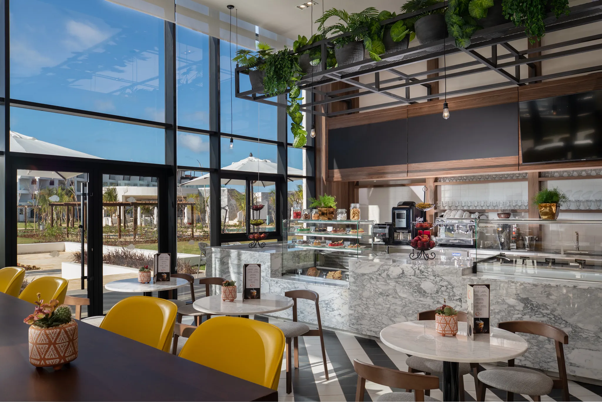 Coco Café at Dreams Macao Beach Punta Cana featuring specialty coffee, pastries, and a modern casual café atmosphere.