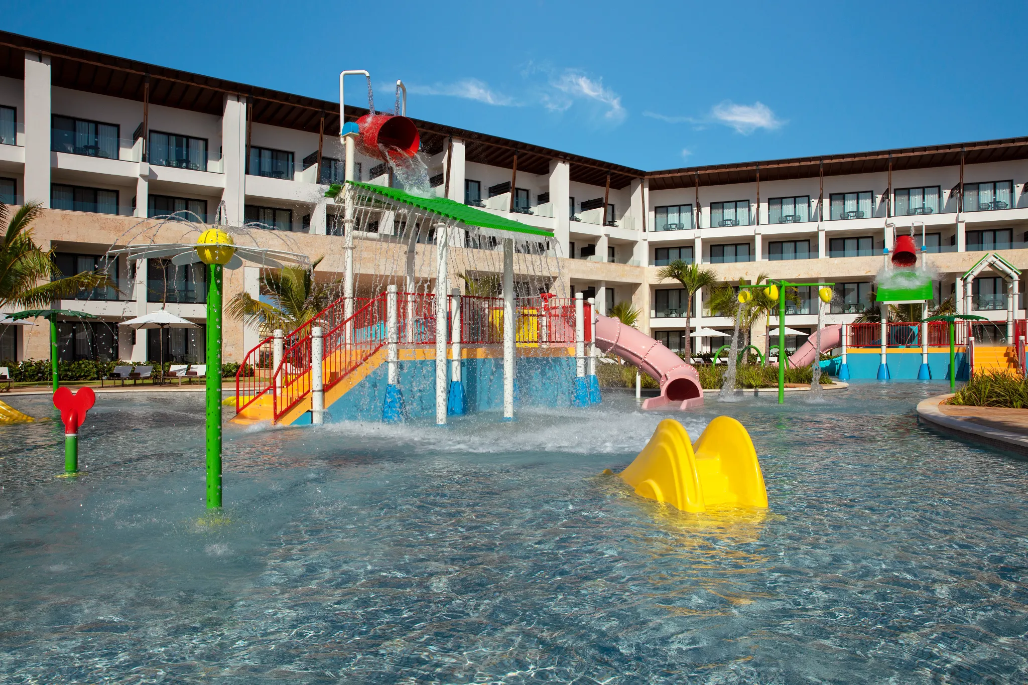 Family water park with slides and splash features at Dreams Macao Beach Punta Cana Resort in the Dominican Republic.
