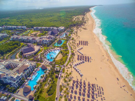 Hard Rock Hotel & Casino Punta Cana massive all-inclusive resort with multiple pools, casino, and rock star amenities in the Dominican Republic.