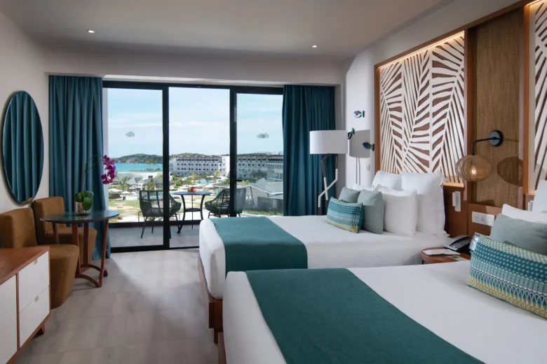 Junior Suite Partial Ocean View with two double beds and balcony at Dreams Macao Beach Punta Cana.