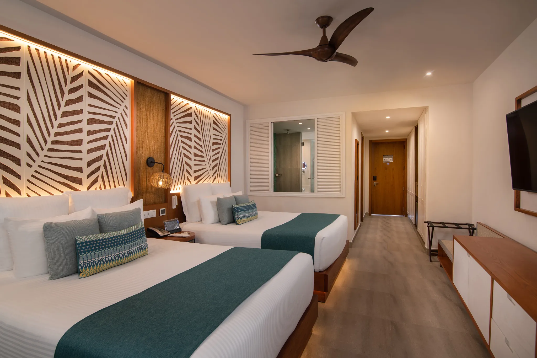 Junior Suite Tropical View with two queen beds at Dreams Macao Beach Punta Cana Resort.