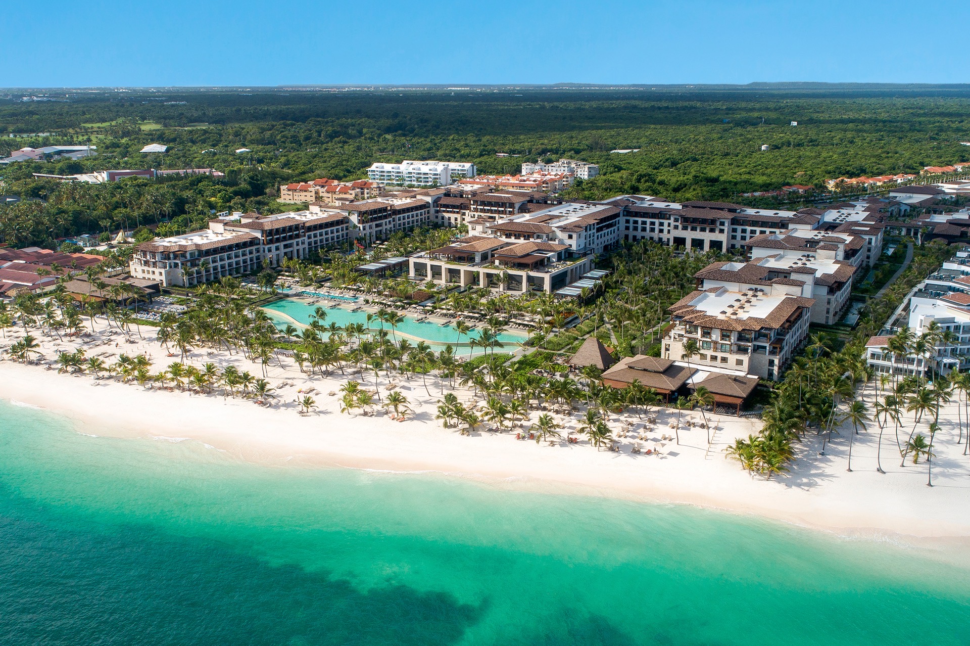 Lopesan Costa Bavaro Resort Spa & Casino luxury all-inclusive with expansive pools, beachfront location, and grand architecture in Bavaro, Punta Cana.