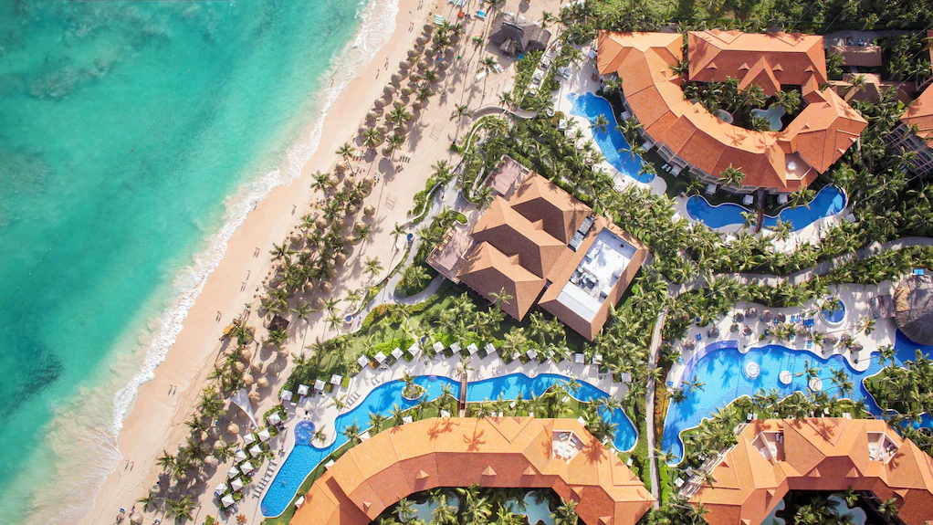 Majestic Elegance Punta Cana luxury all-inclusive resort with expansive pools, beachfront setting, and elegant architecture in Bavaro Beach area.