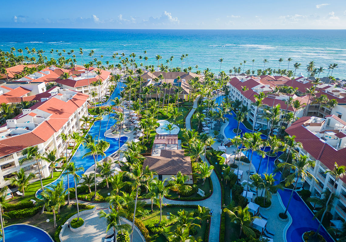 Majestic Mirage Punta Cana luxury all-suite all-inclusive resort with expansive pools, elegant architecture, and beachfront setting in Bavaro.