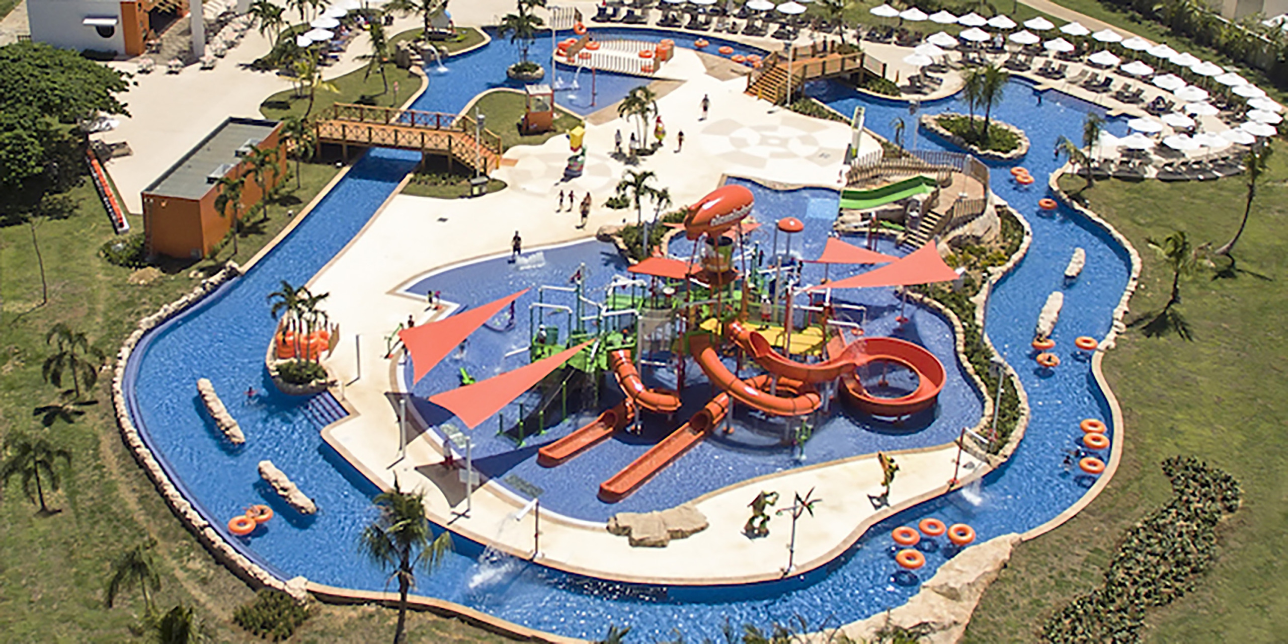 Nickelodeon Hotels and Resorts Punta Cana family all-inclusive resort with Aqua Nick water park, character experiences, and colorful themed suites.