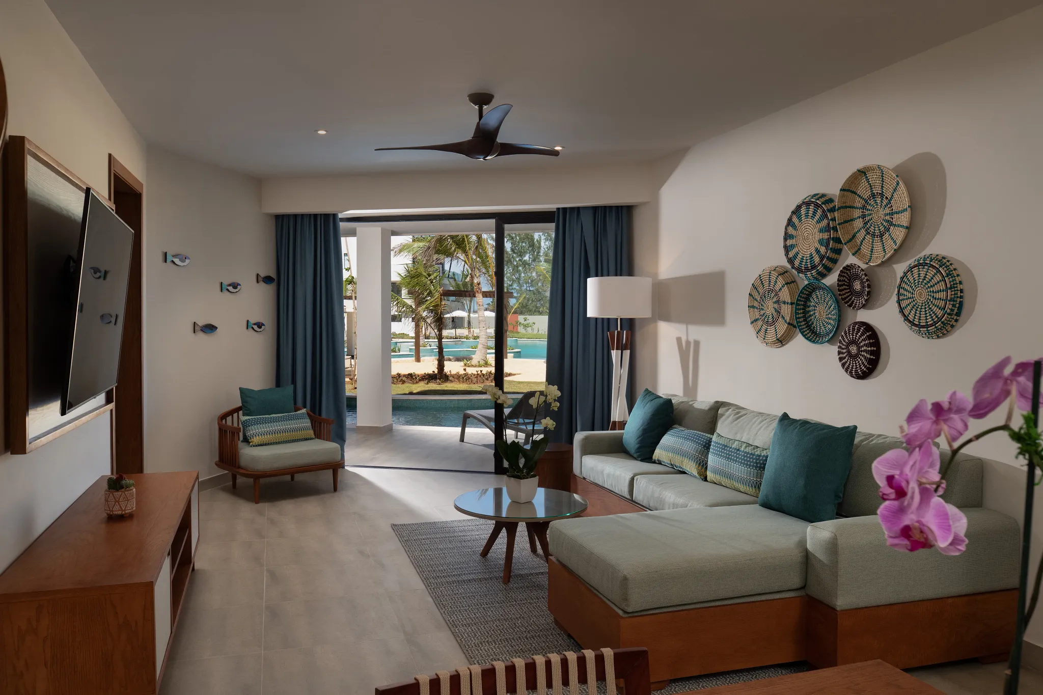 Preferred Club Master Suite Swim Out Ocean Front living room with terrace and pool access at Dreams Macao Beach Punta Cana.