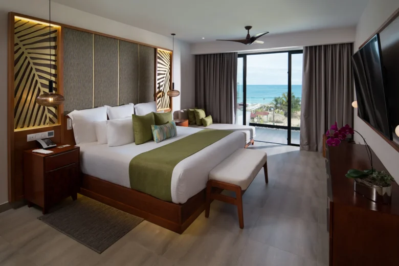 Preferred Club Presidential Suite rooftop bedroom with oceanfront balcony at Dreams Macao Beach Punta Cana.