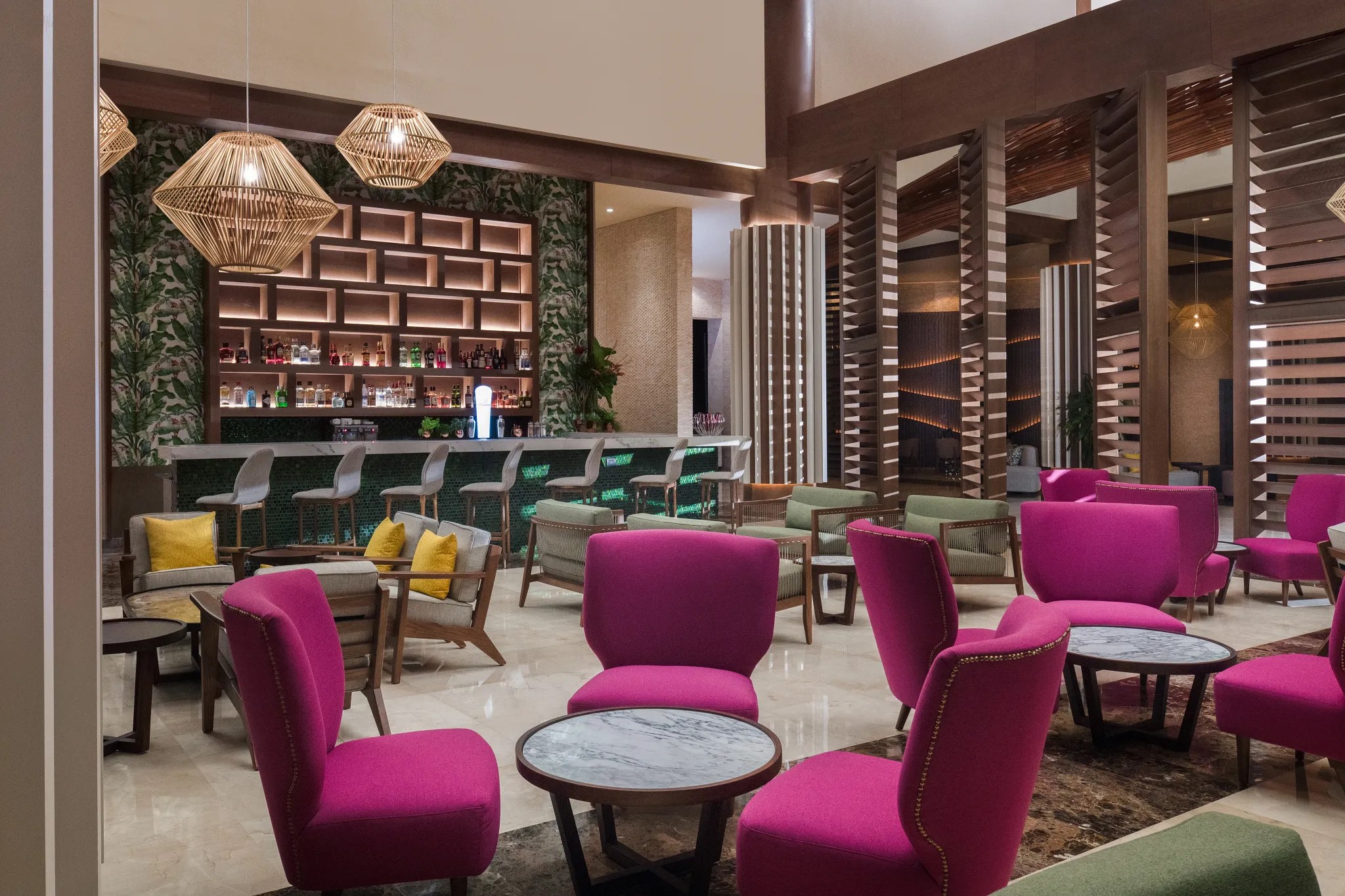 Rendezvous lobby bar at Dreams Macao Beach Punta Cana featuring elegant lounge seating, handcrafted cocktails, and sophisticated resort ambiance.