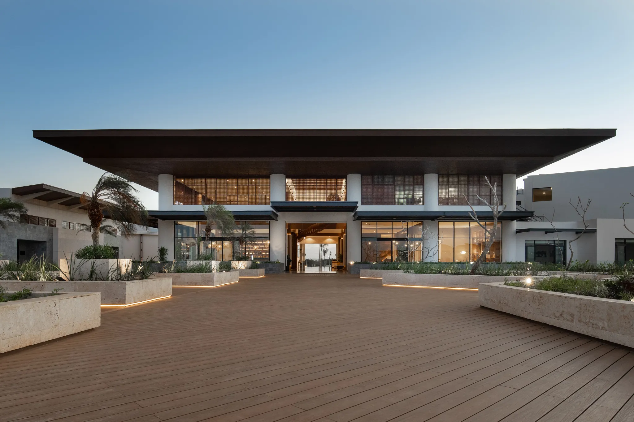 Modern resort lobby entrance at Dreams Macao Beach Punta Cana featuring elegant contemporary architecture.