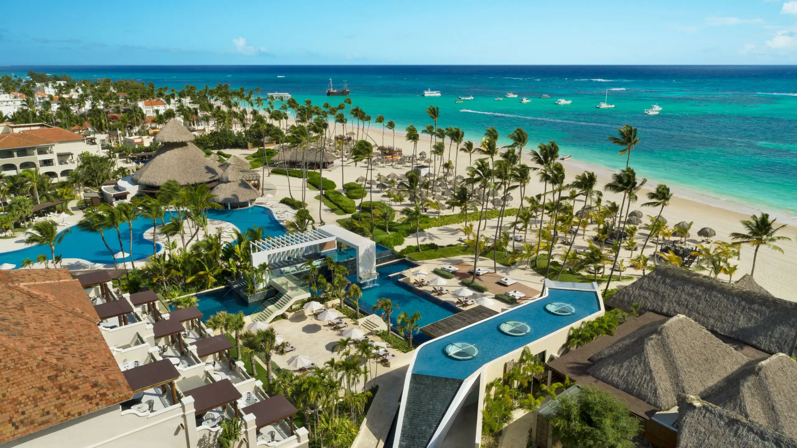 Secrets Royal Beach Punta Cana adults-only all-inclusive resort with beachfront pools, romantic atmosphere, and luxury amenities in the Dominican Republic.