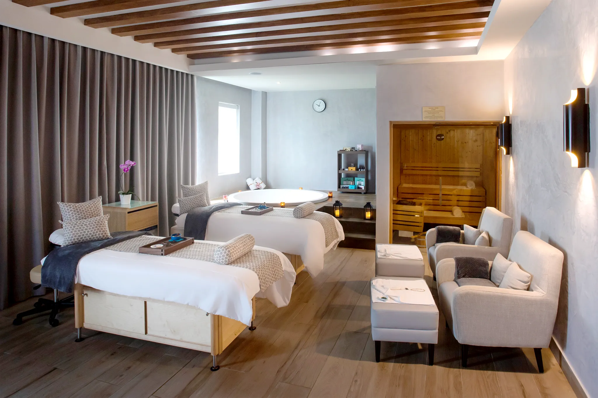 Luxury spa massage suite with sauna and hydrotherapy tub at Dreams Macao Beach Punta Cana Resort.
