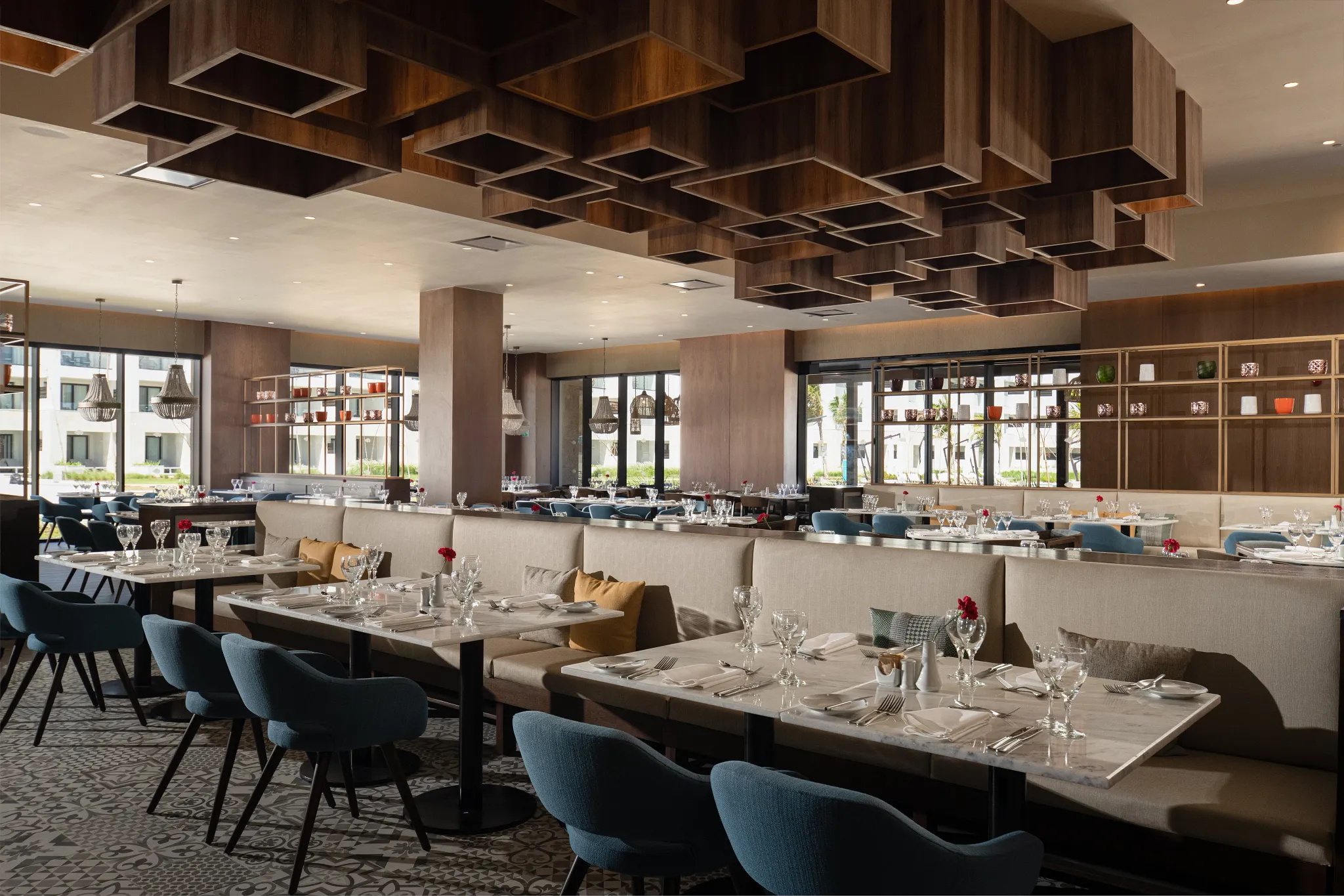 World Café at Dreams Macao Beach Punta Cana featuring international buffet dining, modern décor, and spacious family-friendly seating.